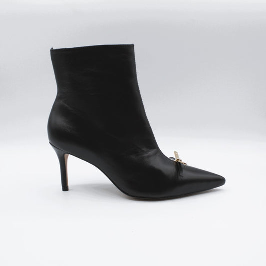 Cecconello tronchetto fiocchetto oro