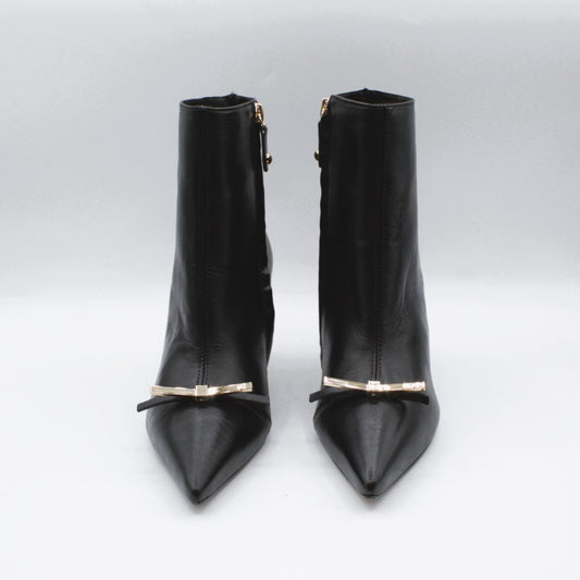 Cecconello tronchetto fiocchetto oro